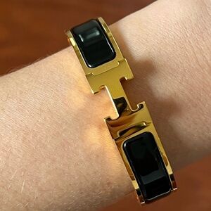 Hermès Clic H Bracelet With Gold and Black Enamel